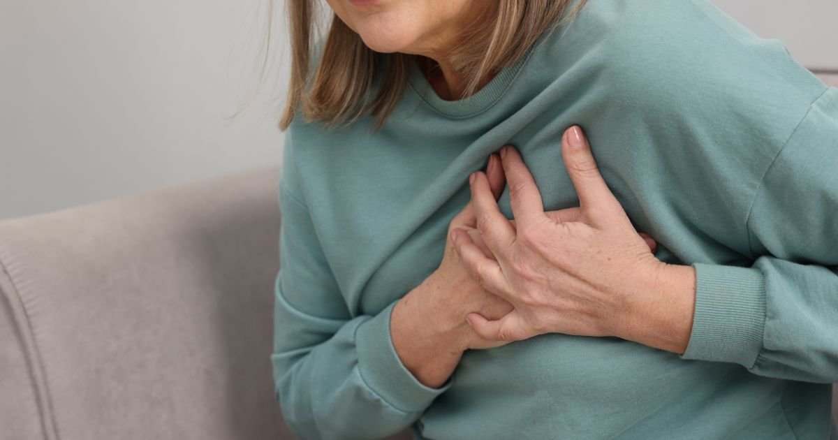 Person with chest palpitations evaluating causes of palpitations.